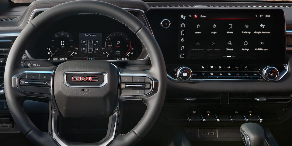 Close-up of the Canyon Elevation Steering Wheel and Infotainment System