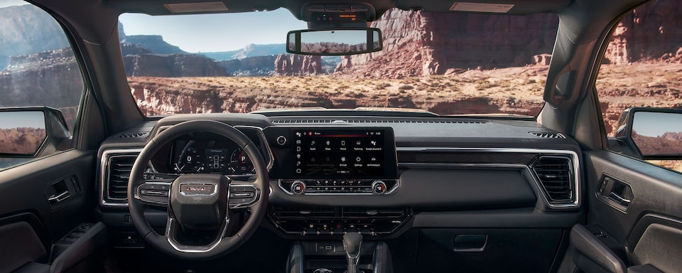 The GMC Canyon Elevation Front Interior with Steering Wheel and Infotainment System