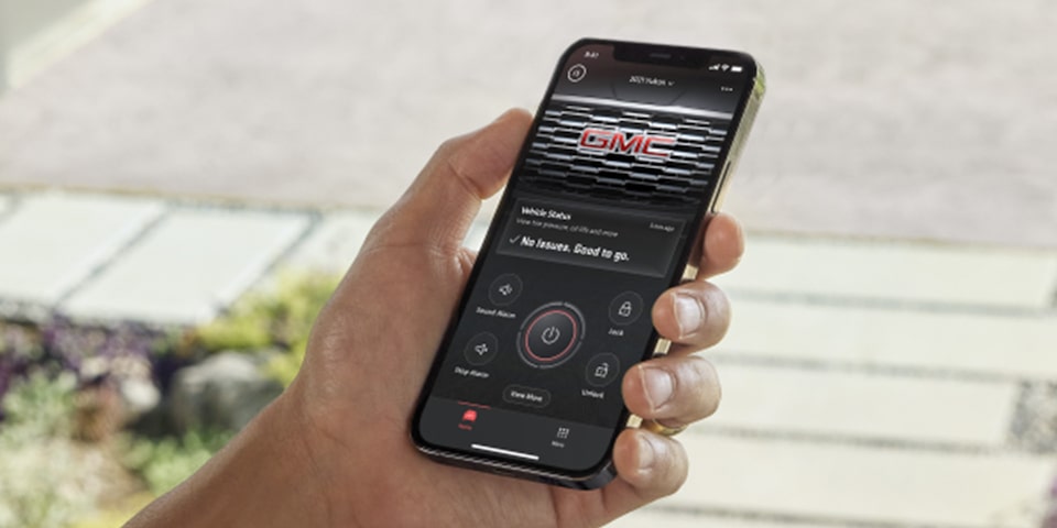 Close-up of a Customer Using Their myGMC App on Their Smartphone