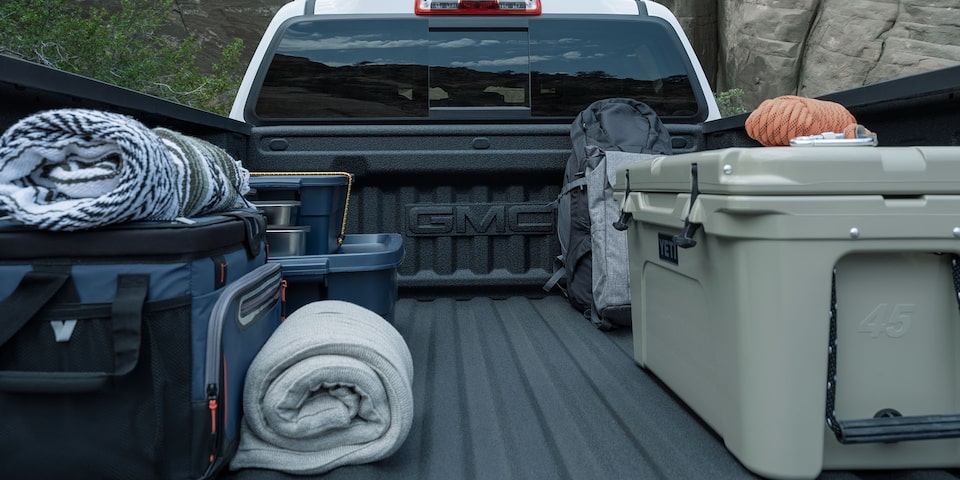 The GMC Canyon Cargo Bed Full of Camping Gear