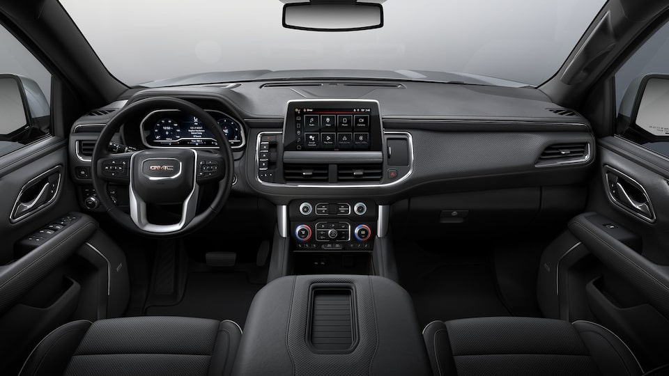 The Jet Black Interior with the Steering Wheel and Infotainment System on the GMC Terrain AT4