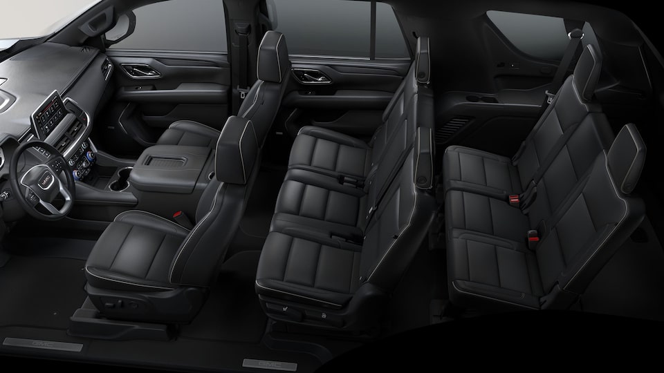 The Jet Black Interior with the Steering Wheel and Infotainment System on the GMC Terrain AT4