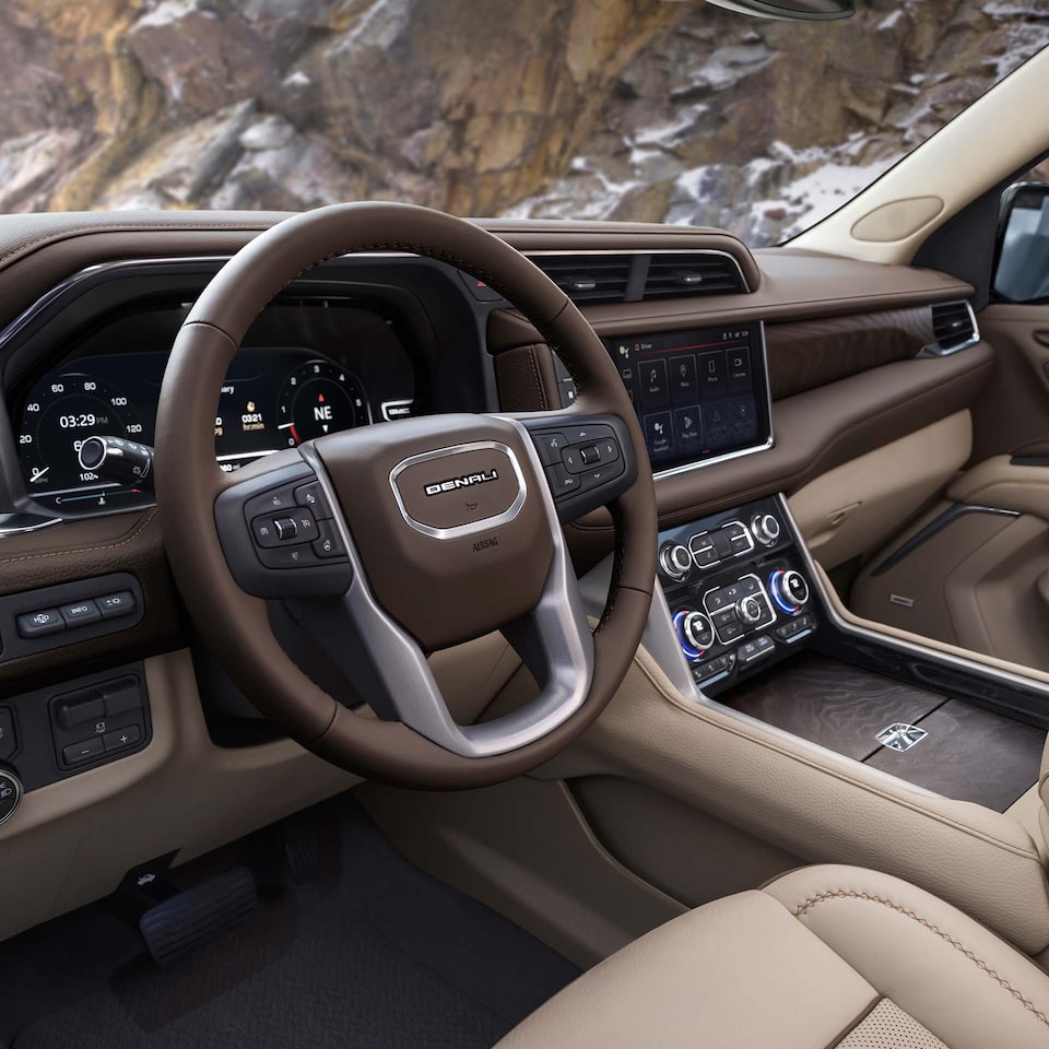 Close-Up of 2024 GMC Yukon Denali Steering Wheel and Dashboard