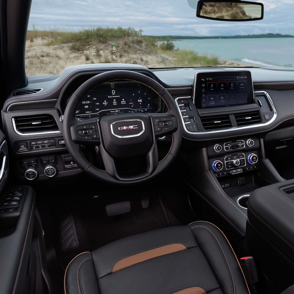 Close-Up of 2024 GMC Yukon Denali Steering Wheel and Infotainment System